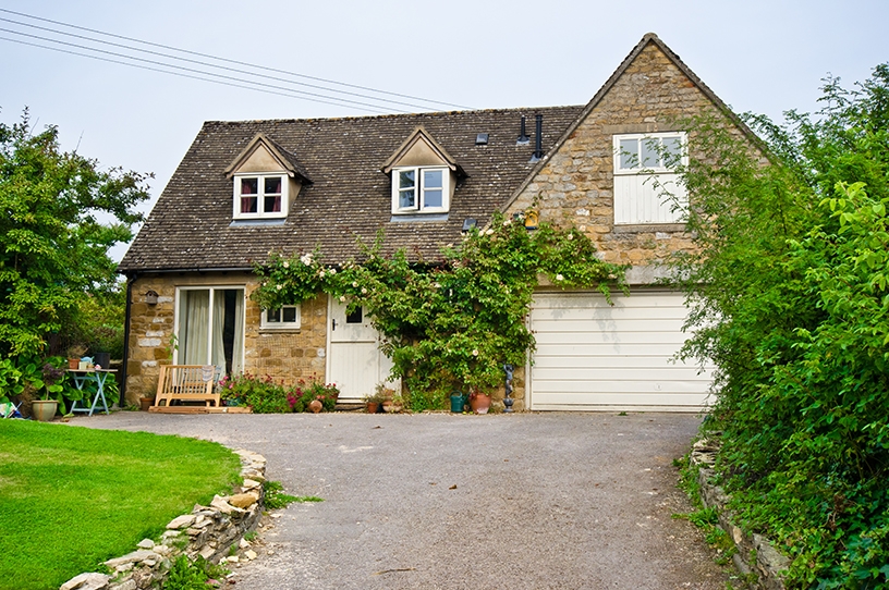 Garage door fitted into country cottage