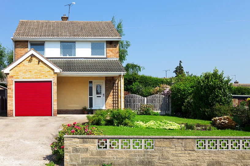 Detached house and red garage