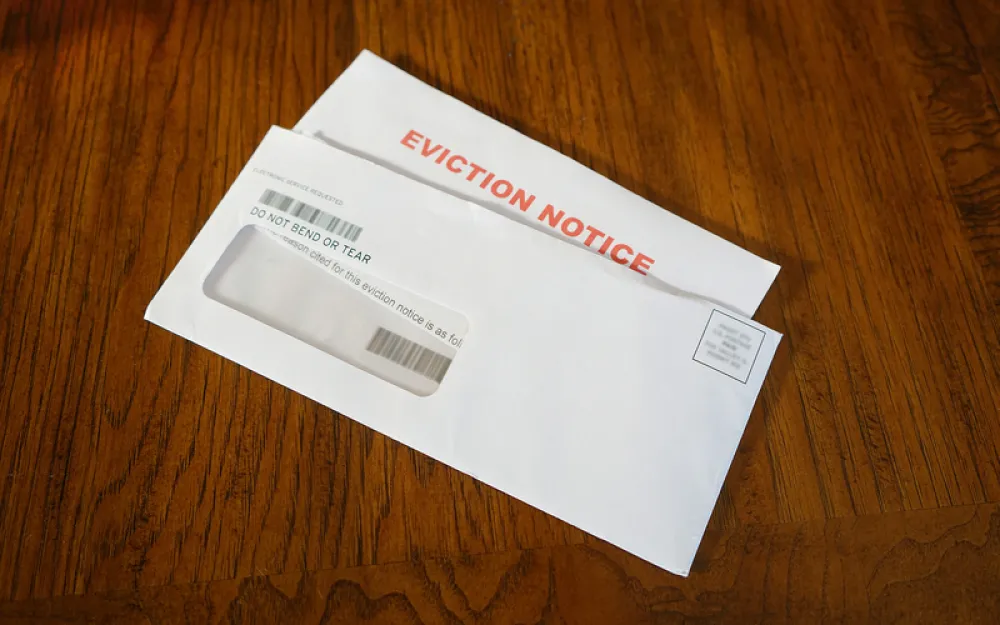 Eviction notice on door mat