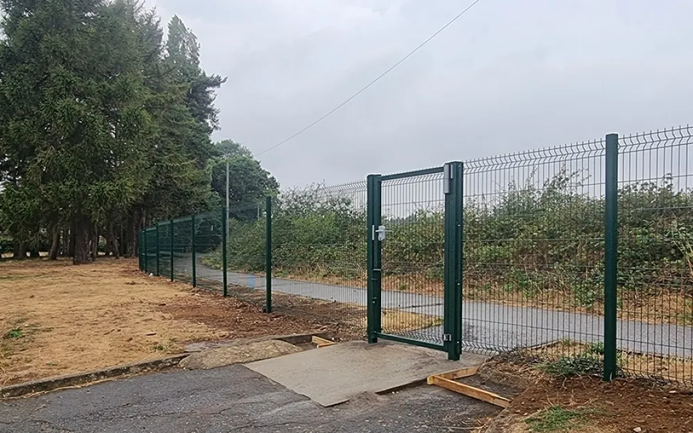 school gates in palisade fence