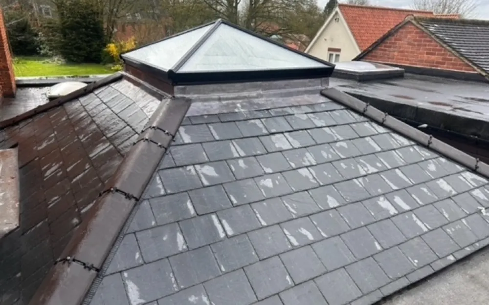 Completed slate roof replacement and Korniche lantern installation