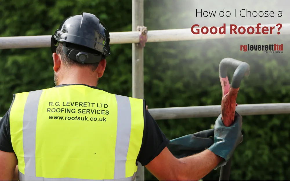 image of roofer wearing hi-vis and a hard hat with RG Leverett's logo on