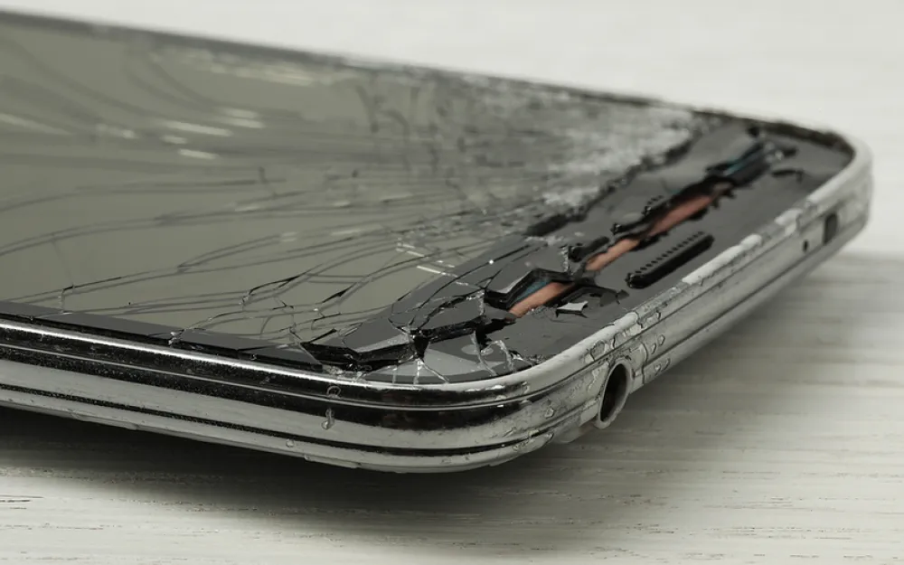 E waste cracked smartphone
